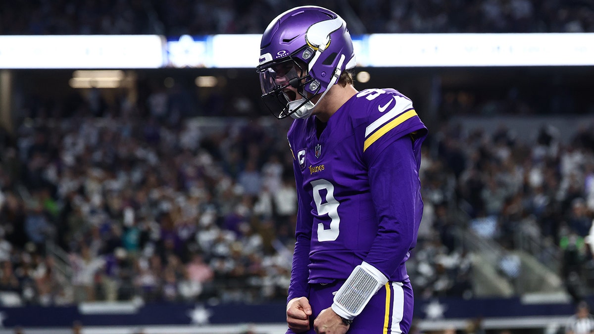 J.J. McCarthy celebrates touchdown