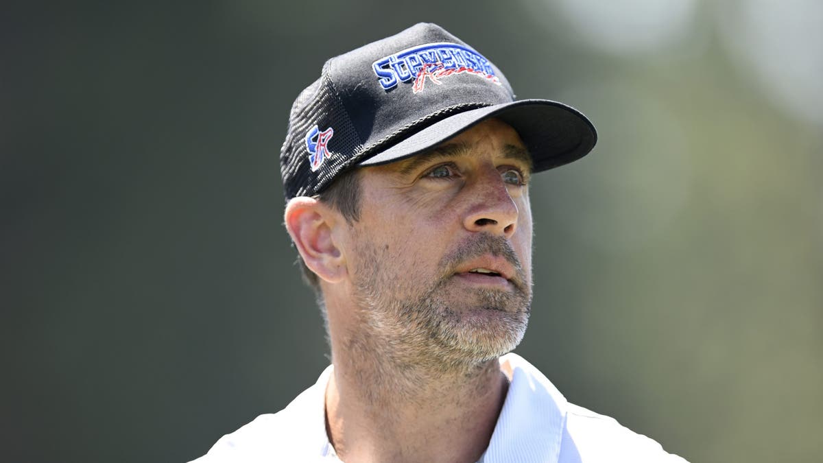 Aaron Rodgers during a golf event