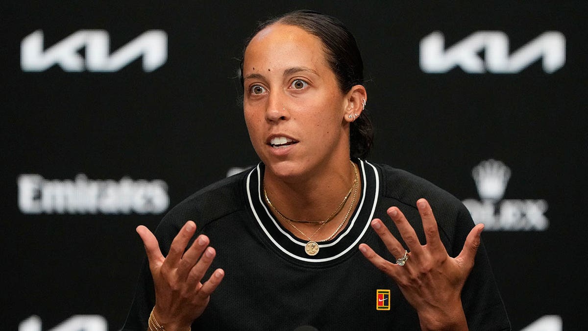 Madison Keys talks at a press conference