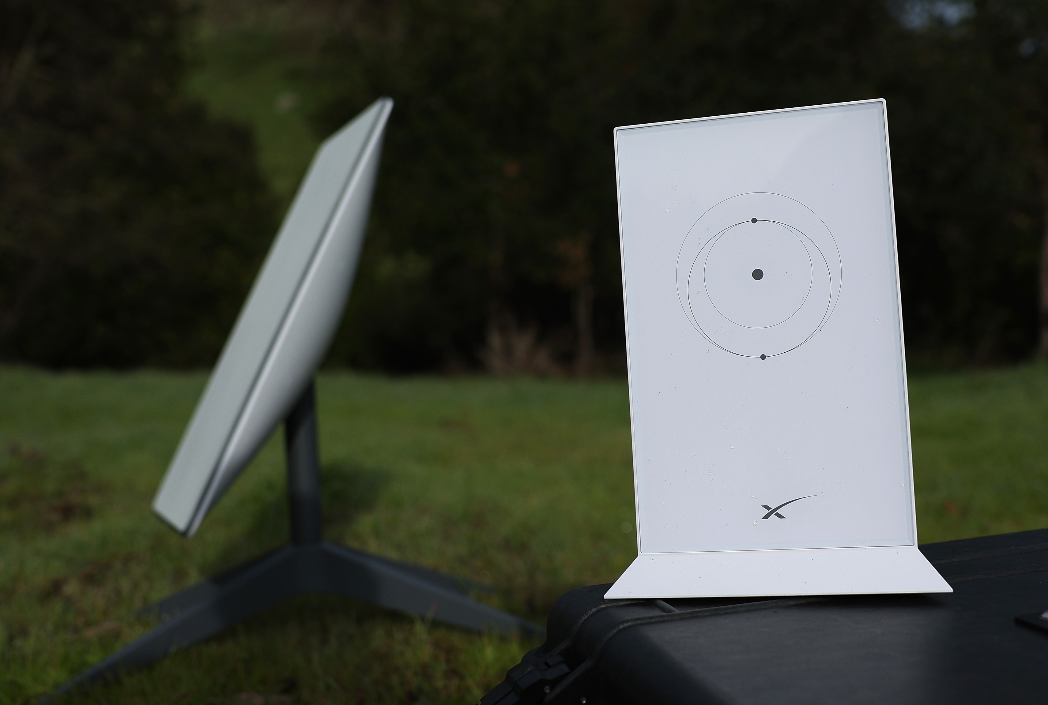 In this photo illustration, a Starlink dish and router are displayed on Feb. 12, 2024, in San Anselmo, California.