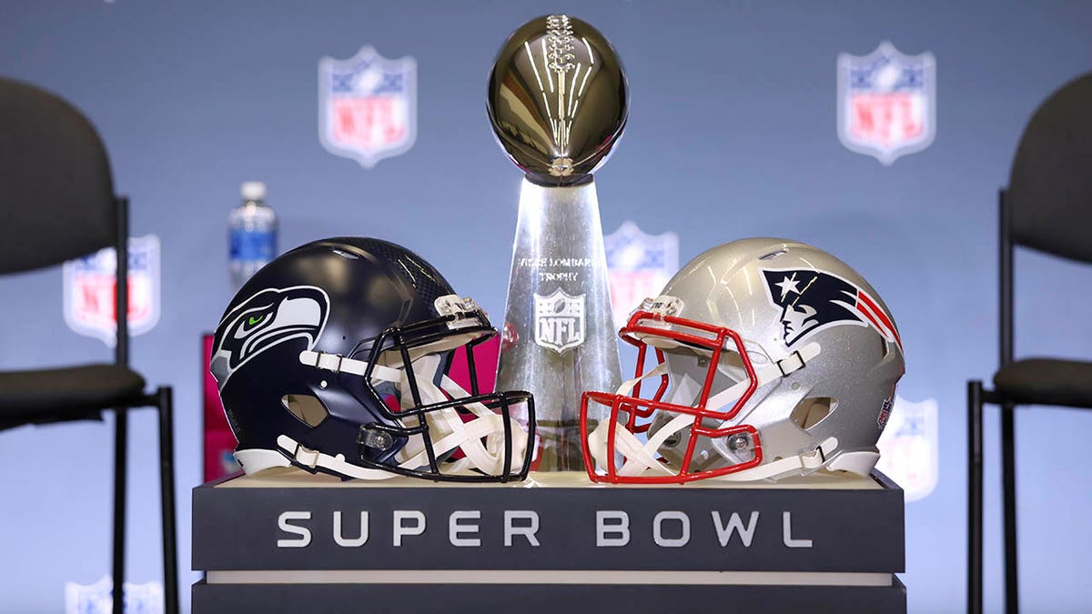 Seahawks and Patriots helmets sit