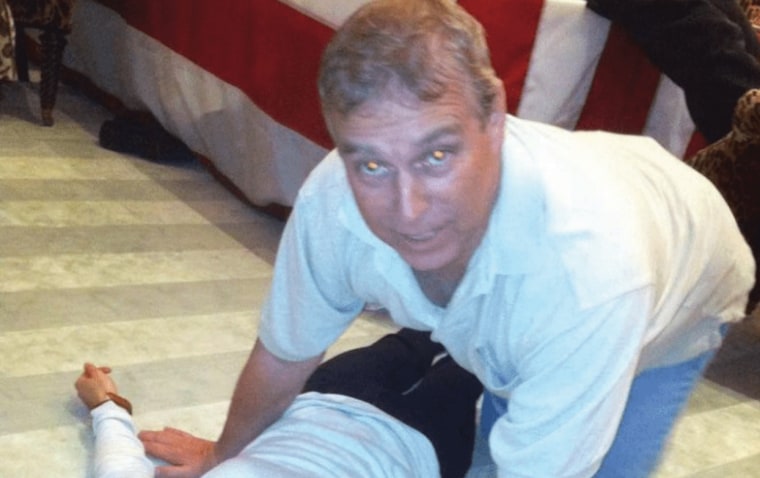 A photograph from an Epstein document release appears to show Andrew Mountbatten-Windsor kneeling over an unknown female.