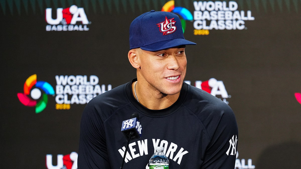 Aaron Judge looks on during media session