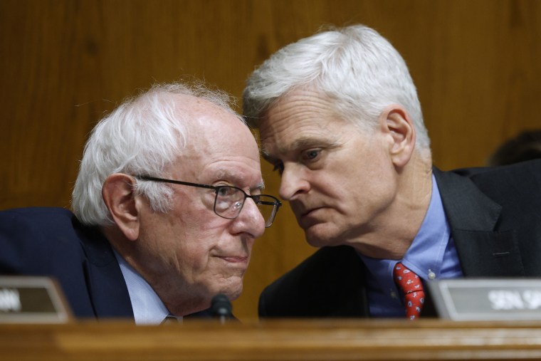 Sen. Bernie Sanders, I-Vt., speaks with Sen. Bill Cassidy, R-La., during a Senate Committee on Health, Education, Labor, and Pensions hearing on Sept. 17, 2025.