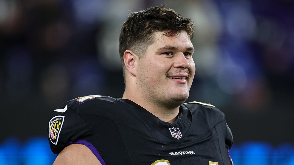 Tyler Linderbaum smiles