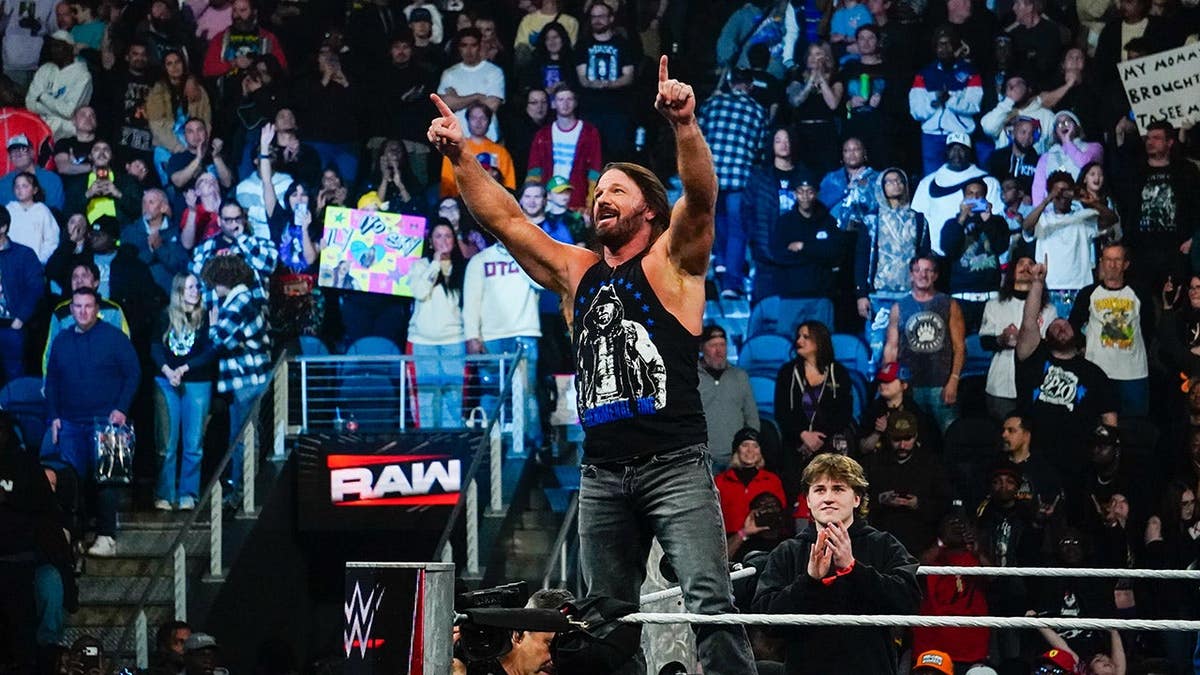 AJ Styles pointing to the crowd during Monday Night RAW at State Farm Arena in Atlanta