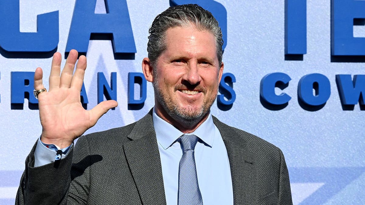 Steve Beuerlein waving at Netflix event in Los Angeles