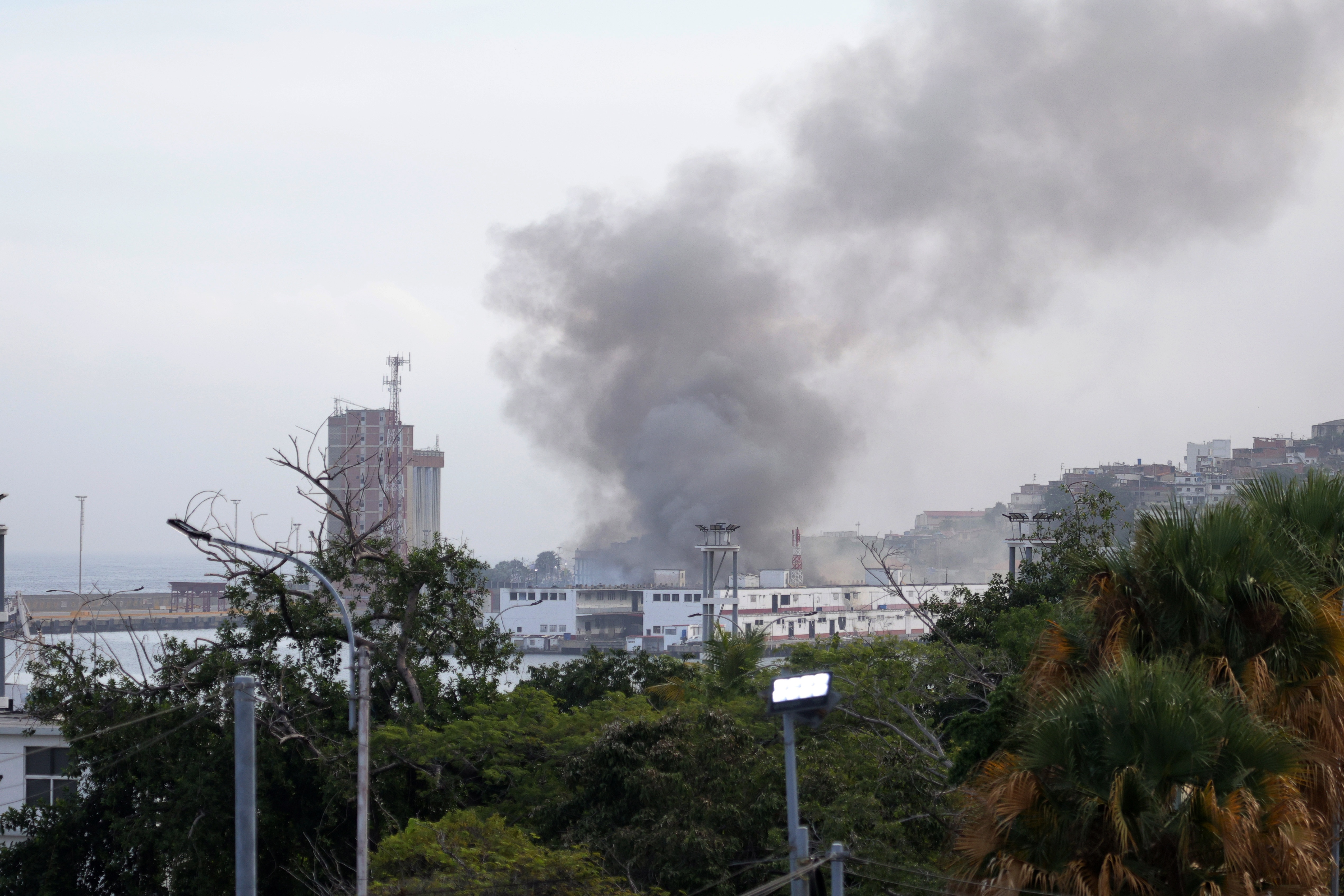 Smoke rises from Port of La Guaira in Venezuela on Jan. 3, 2026 after U.S. forces seized the country