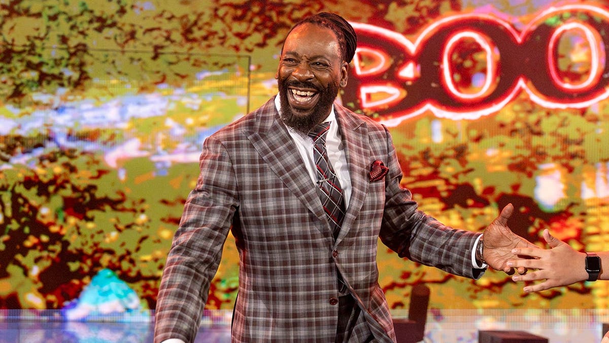 Booker T making his entrance at NXT event in Ball Arena Denver Colorado