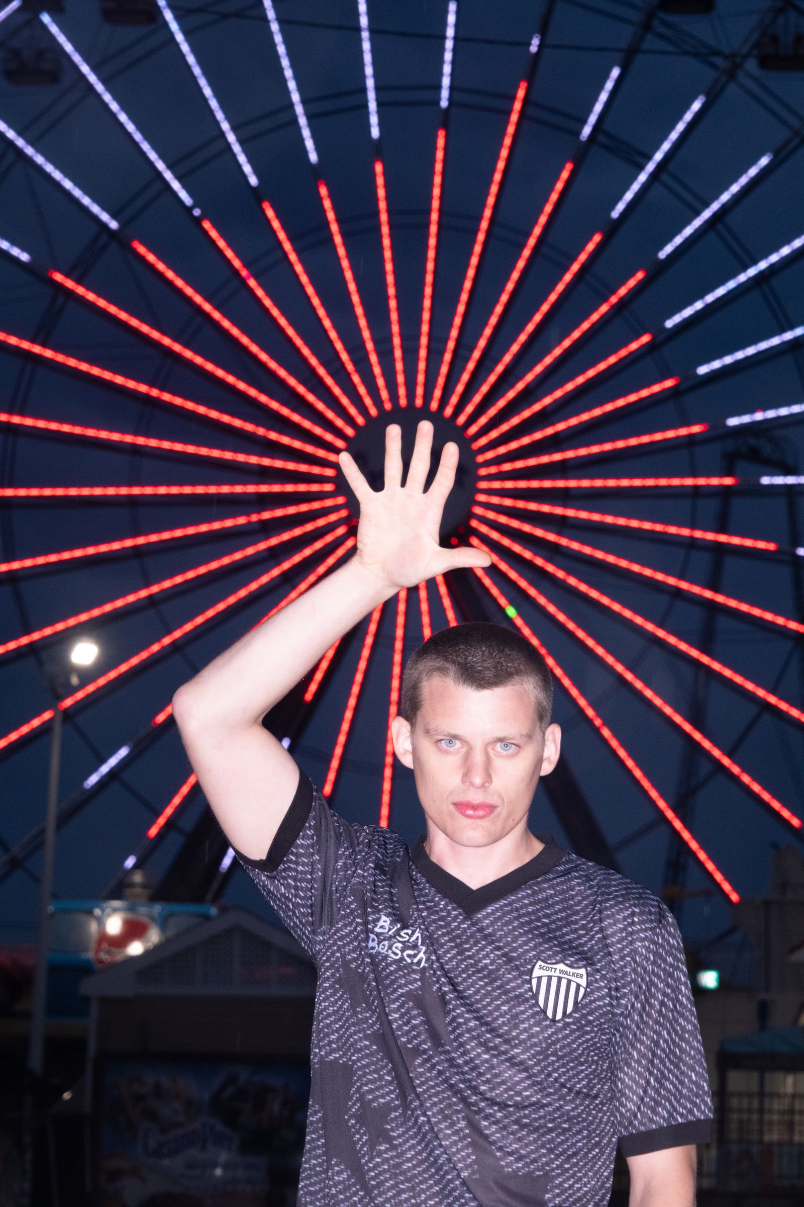Image may contain Dean Barker Face Head Person Photography Portrait Lighting Urban Adult Nature and Night
