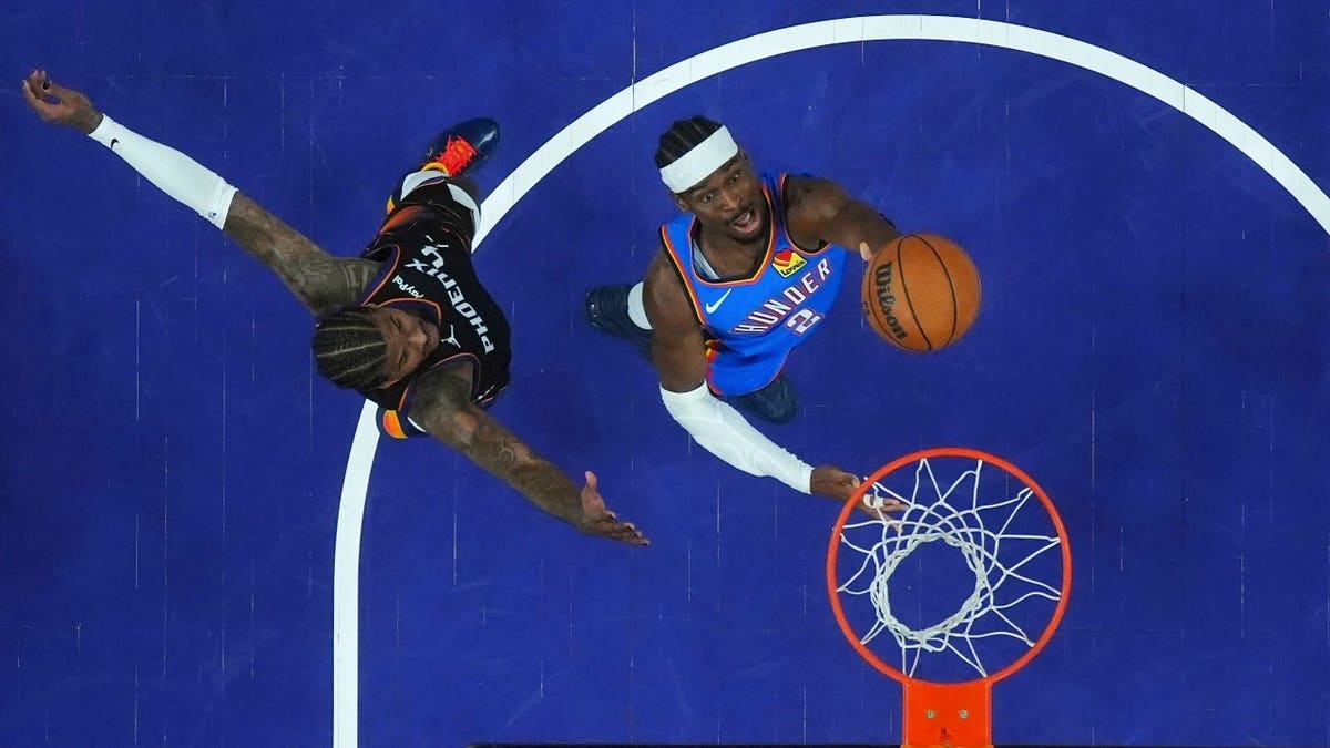Oklahoma City Thunder All-Star Shai Gilgeous-Alexander gets to the rim vs. the Phoenix Suns in Game 3 of their first-round series in the 2026 NBA Playoffs.