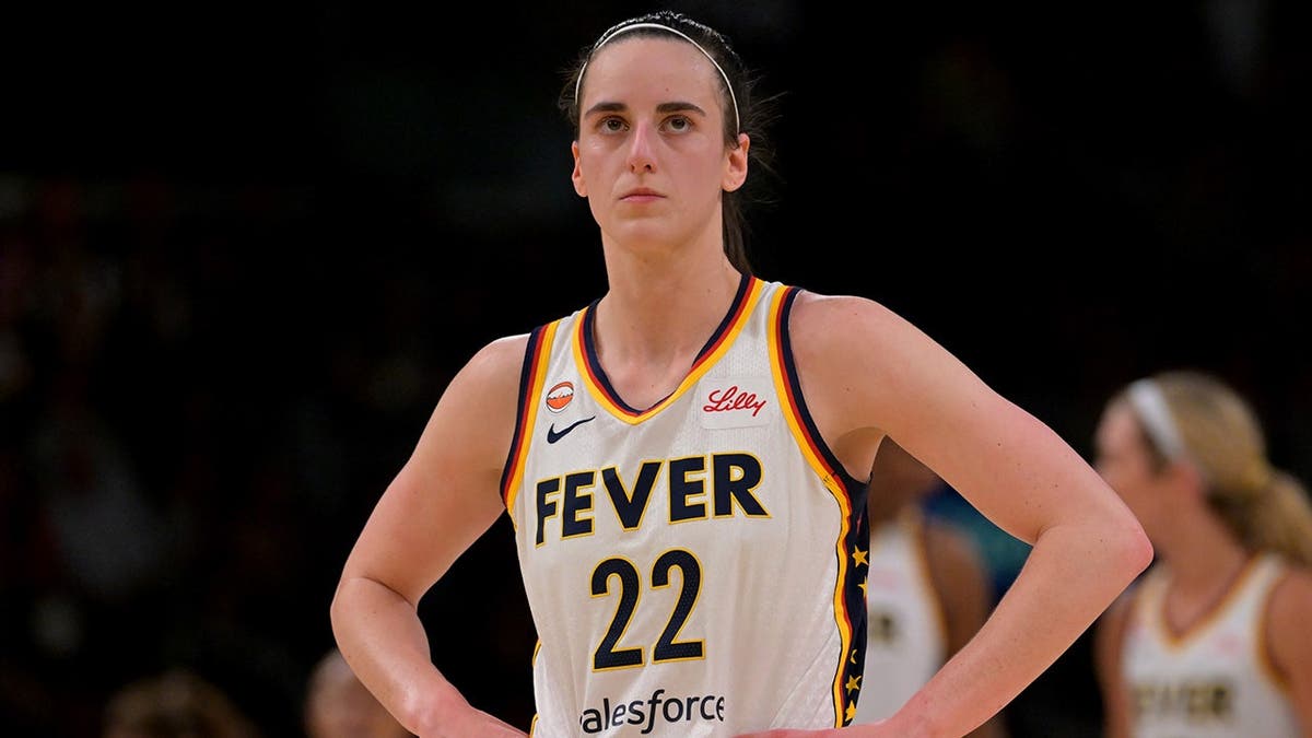 Indiana Fever guard Caitlin Clark looking on during a basketball game at Crypto.com Arena
