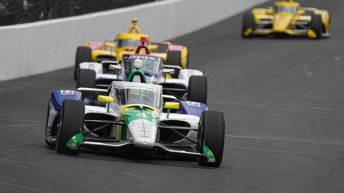 Caio Collet leading the field during the Indianapolis 500 auto race at Indianapolis Motor Speedway