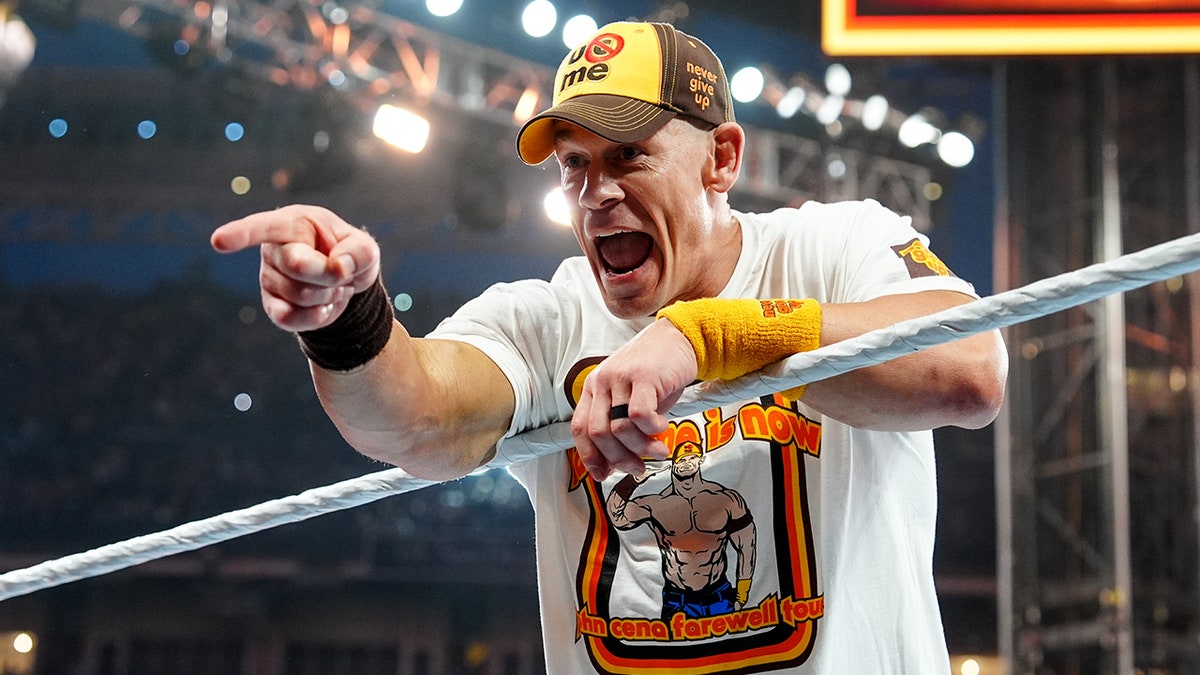 John Cena entering the wrestling ring at Survivor Series event