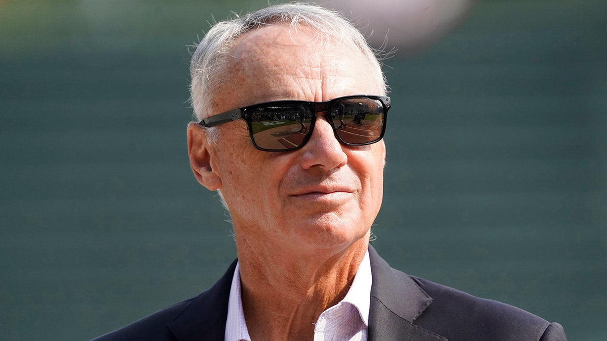 Baseball commissioner Rob Manfred speaking at a press conference in Chicago