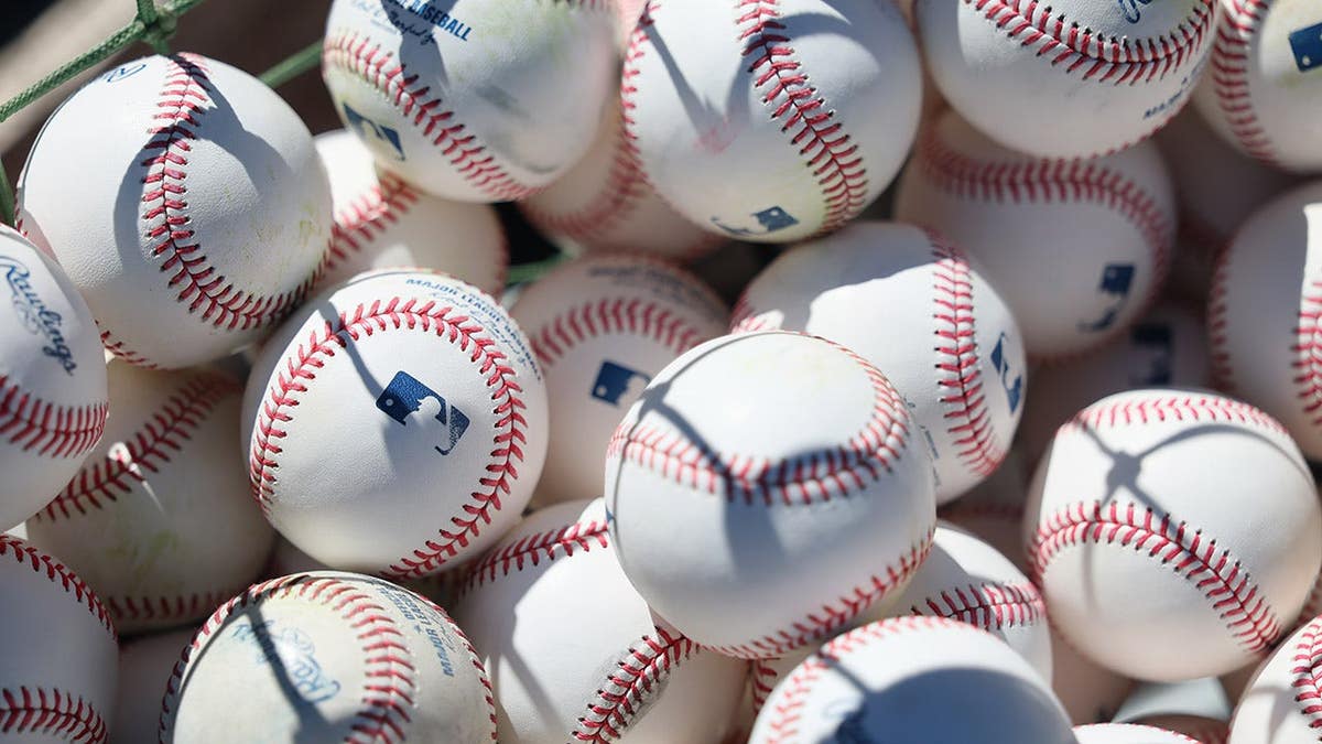 Close up of baseballs on field before Colorado Rockies and Philadelphia Phillies game
