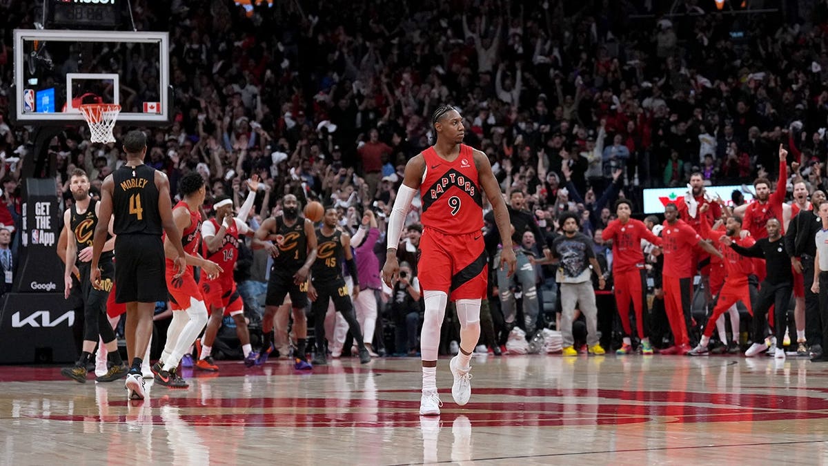 Toronto Raptors forward RJ Barrett reacts after scoring winning basket in overtime