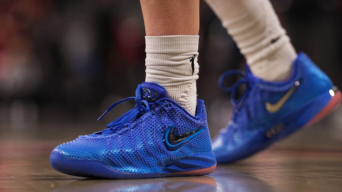 Caitlin Clark's sneakers displayed on the court at Gainbridge Fieldhouse.