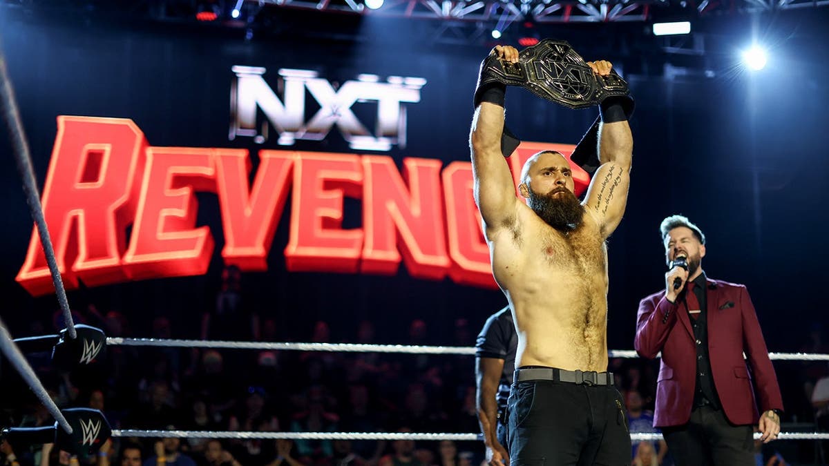 NXT Champion Tony D'Angelo looking on in ring at WWE Performance Center in Orlando, Florida