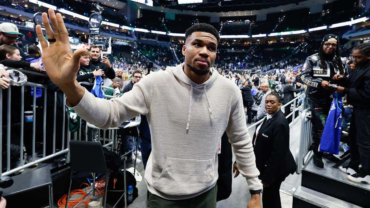 Milwaukee Bucks forward Giannis Antetokounmpo walking off the basketball court.