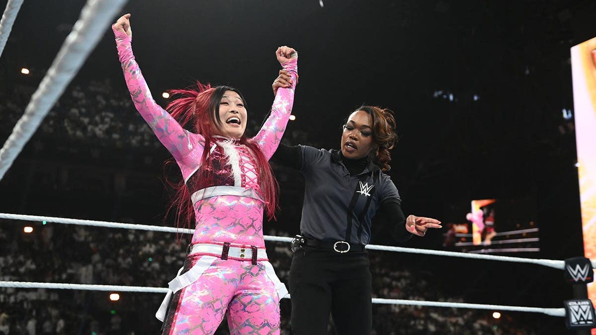 Iyo Sky celebrating in the ring after defeating Liv Morgan at Kingdom Arena in Riyadh