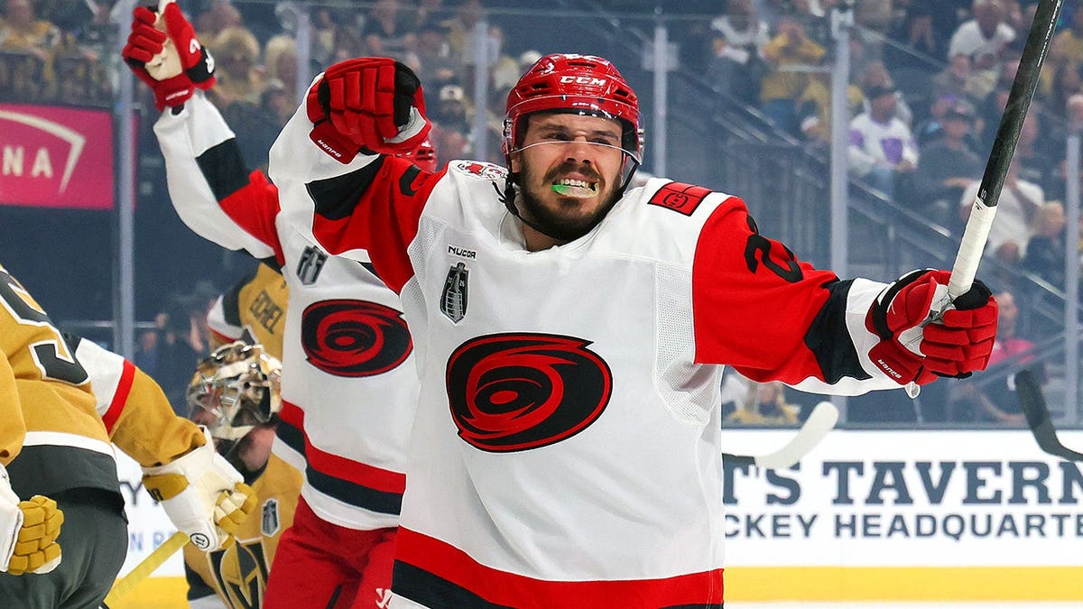 Logan Stankoven of the Carolina Hurricanes celebrates after scoring a goal at T-Mobile Arena in Las Vegas