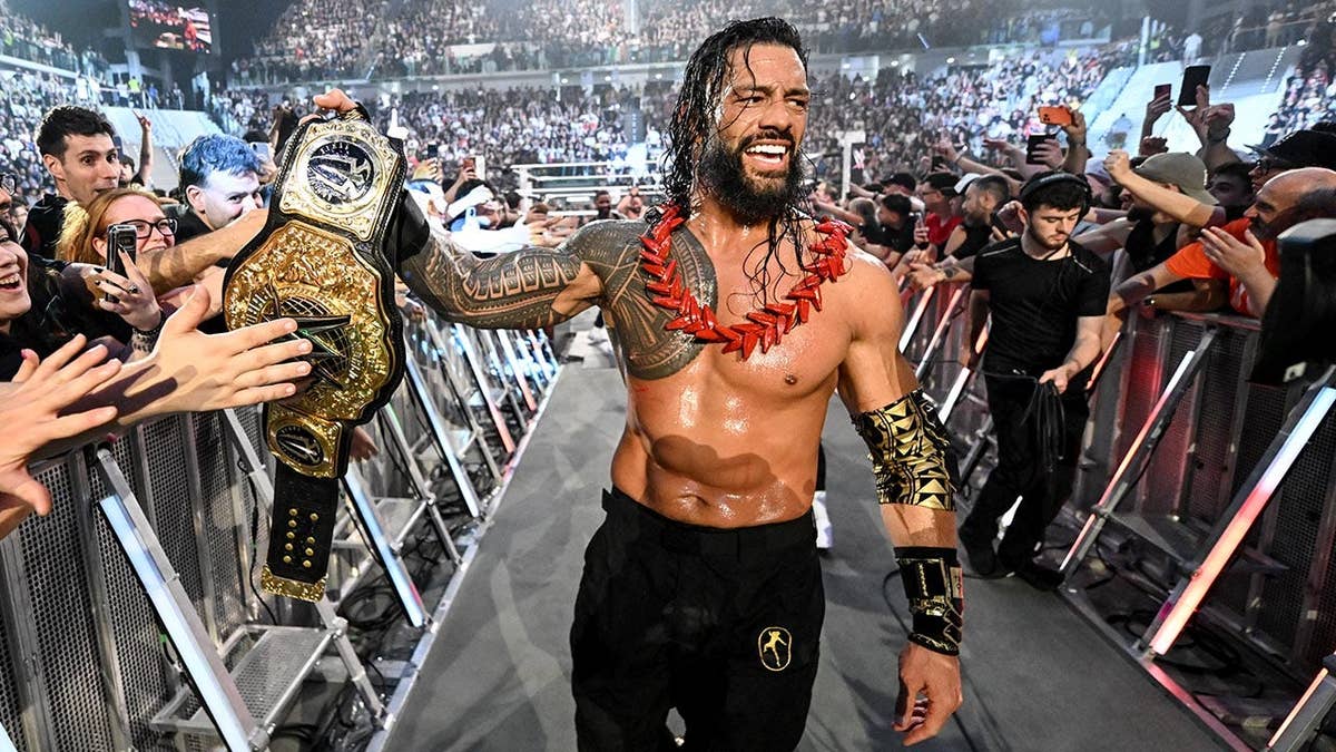 Roman Reigns celebrating his win at Inalpi Arena in Torino di Sangro Italy