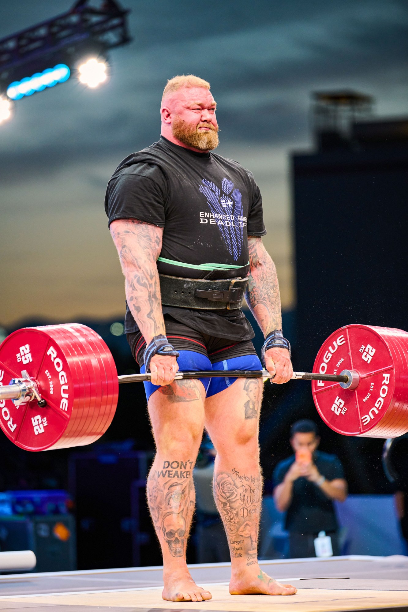 Hafþór Júlíus Björnsson holding a barbell at mid thigh