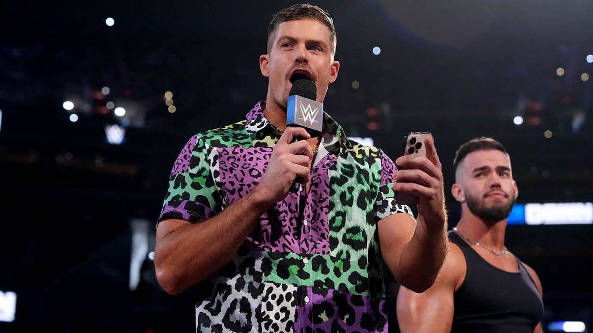 Grayson Waller and Austin Theory addressing the crowd during SmackDown at Capital One Arena in Washington, D.C.