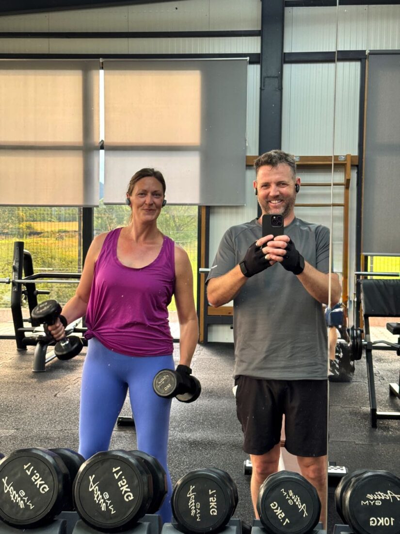 two people working out at the gym