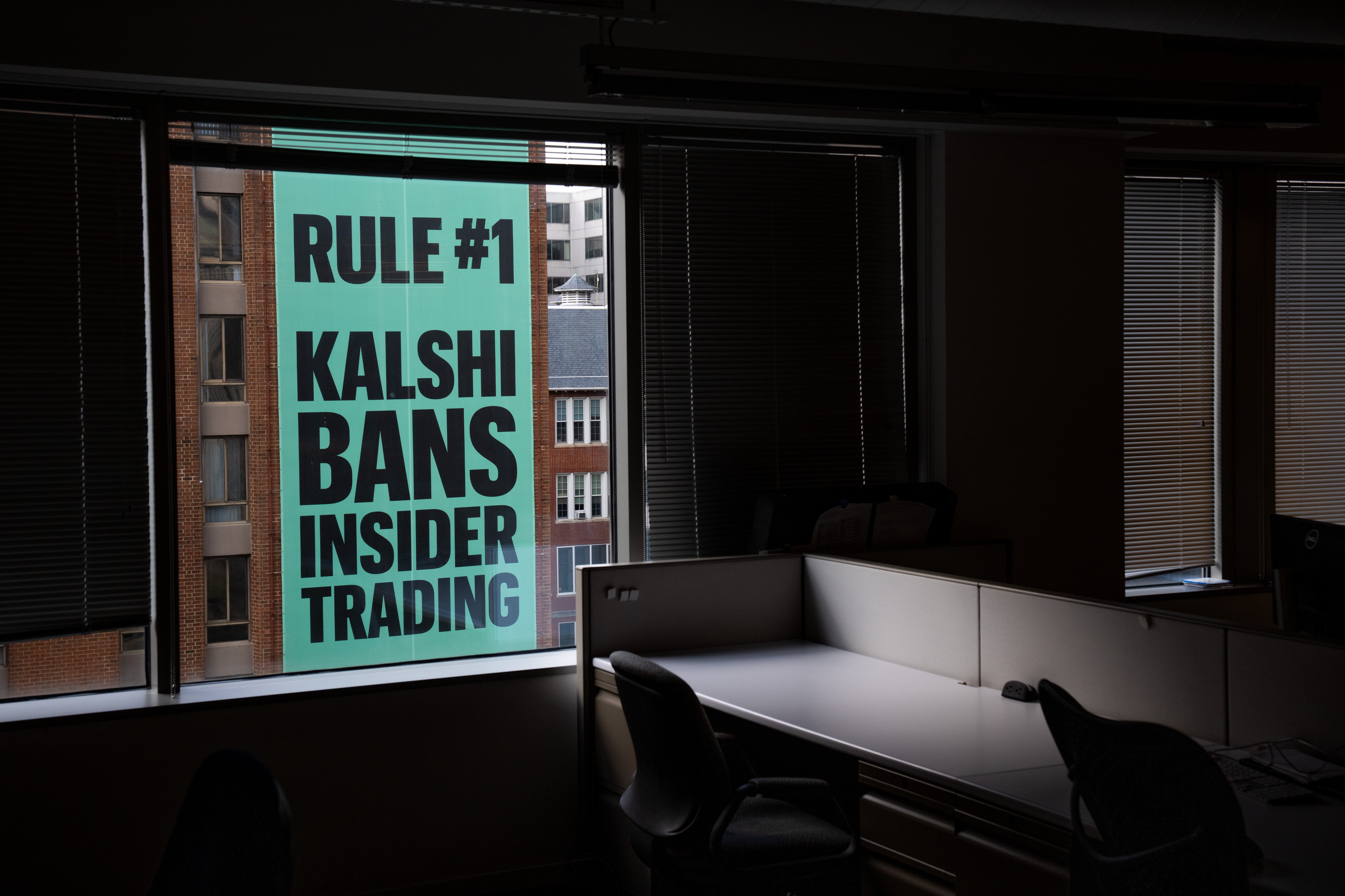 A banner for the prediction market platform Kalshi hangs from a building on April 1.