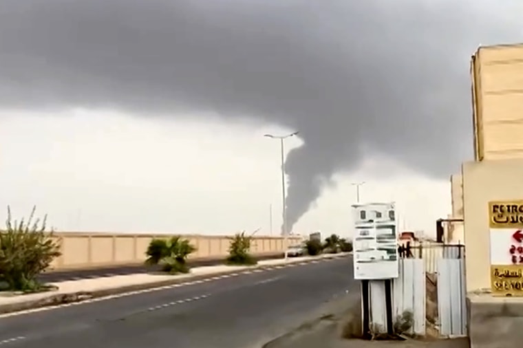 A plume of smoke rises in Jizan, Saudi Arabia, as Yemen's Iran-aligned Houthis said Saturday they carried out operations targeting Saudi Aramco facilities.