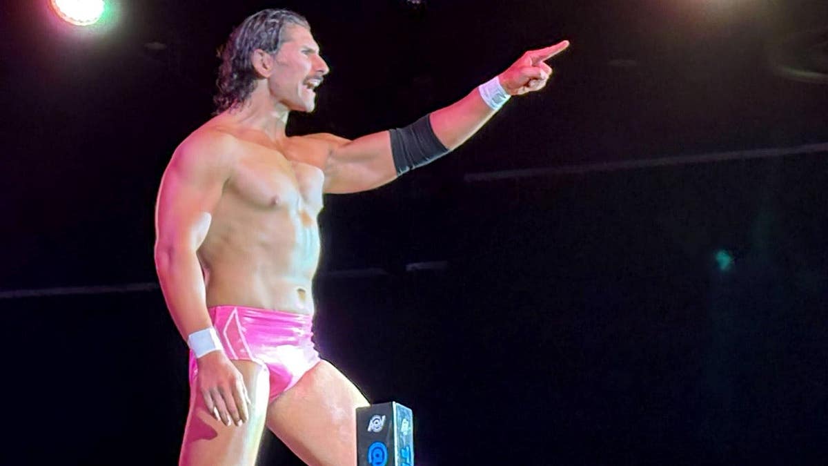 Richard Holliday on the top turnbuckle