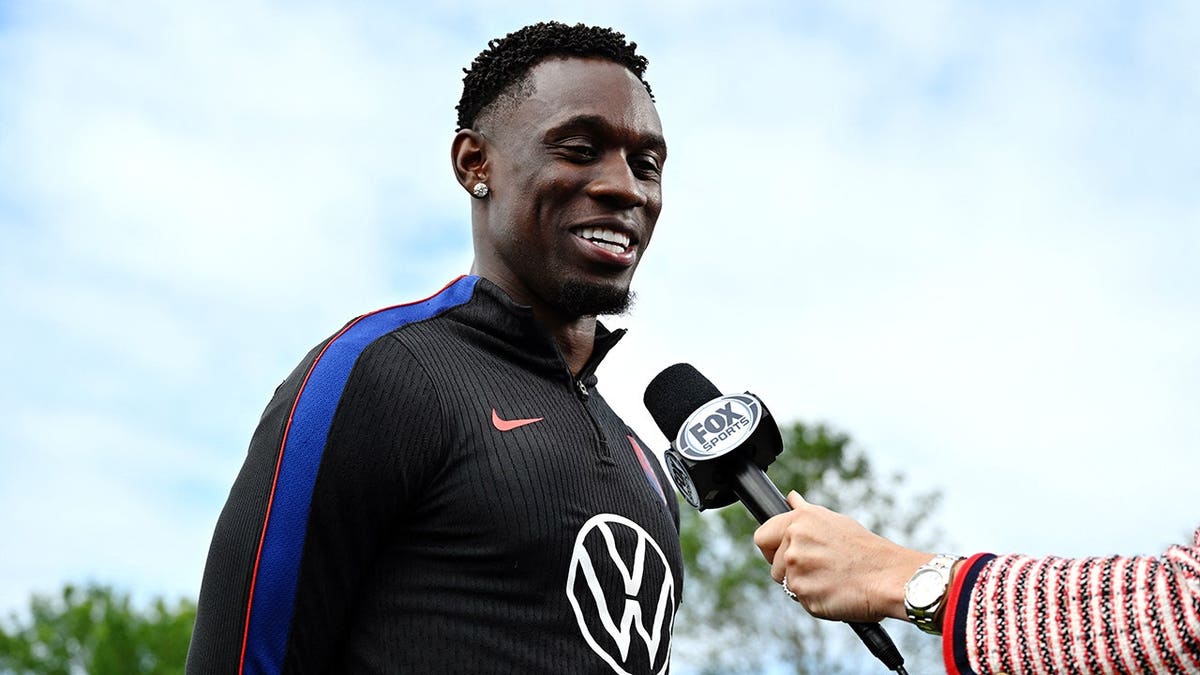 Folarin Balogun of the U.S. speaks to media before training in Seattle, Washington.