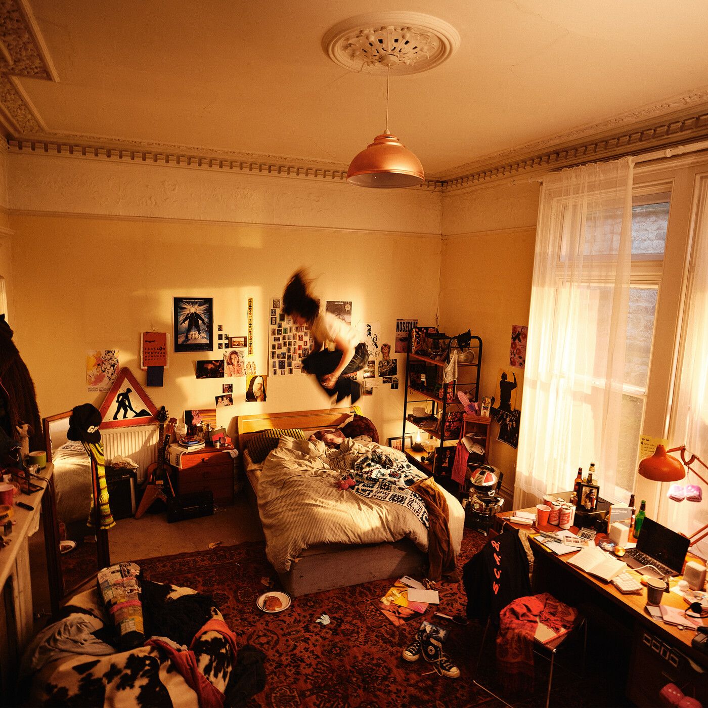 Image may contain Bed Bedroom Dorm Room Furniture Indoors Room Adult Person Lighting Home Decor and Dressing Room