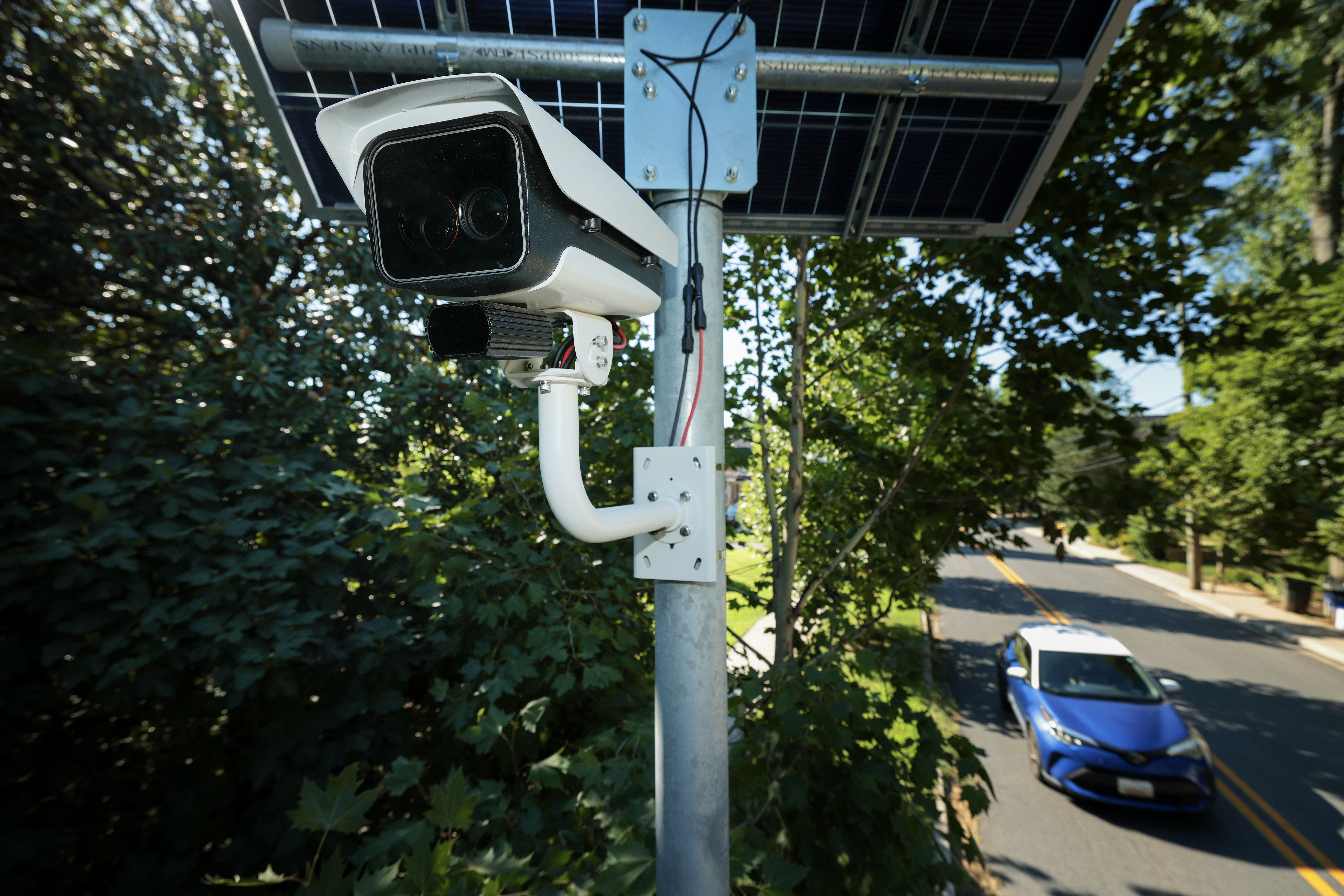 An automatic license plate reader (ALPR) camera monitors traffic on Wednesday in Silver Spring, Md.