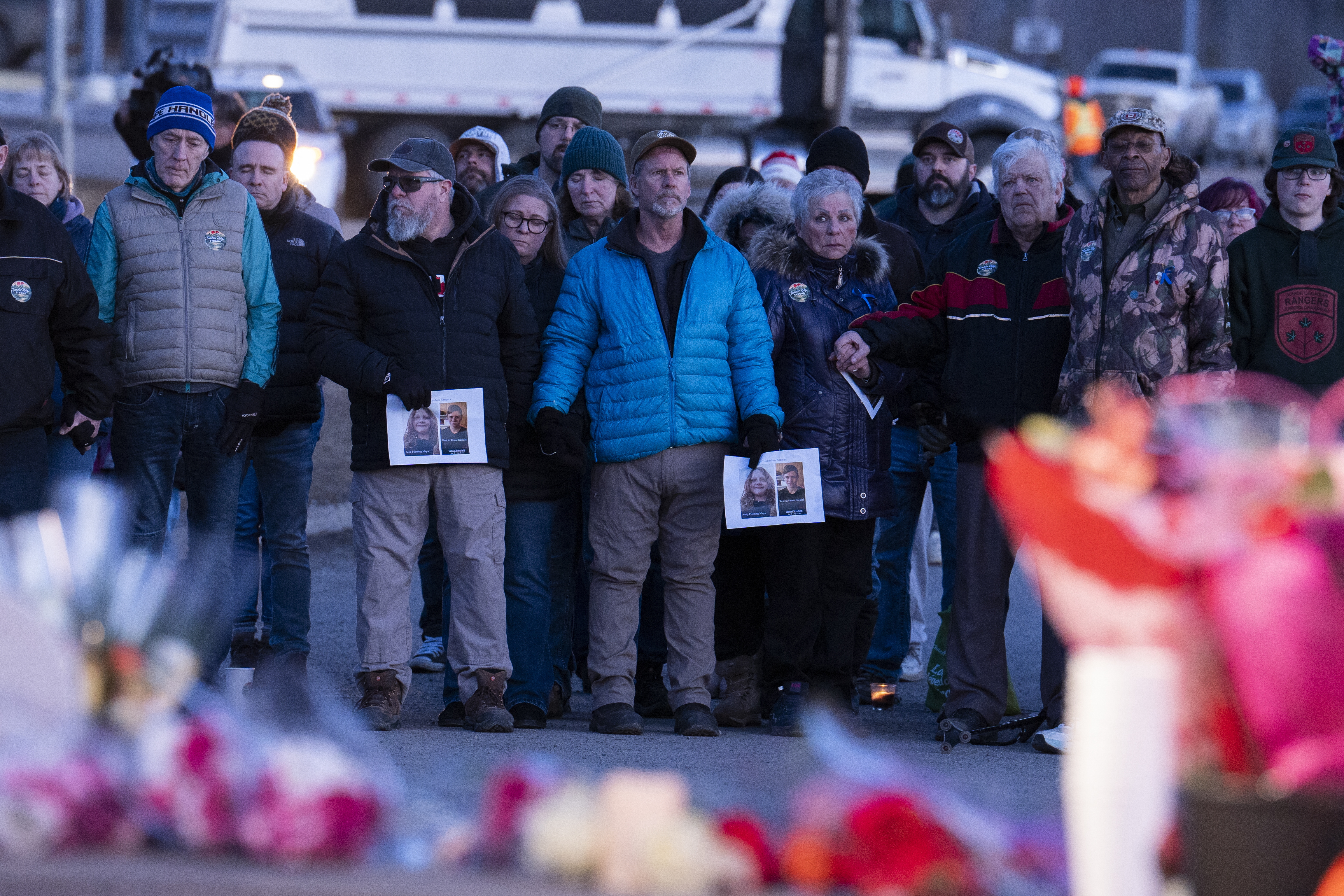Community members attend a vigil on Feb. 13 to honor the victims of one of Canada