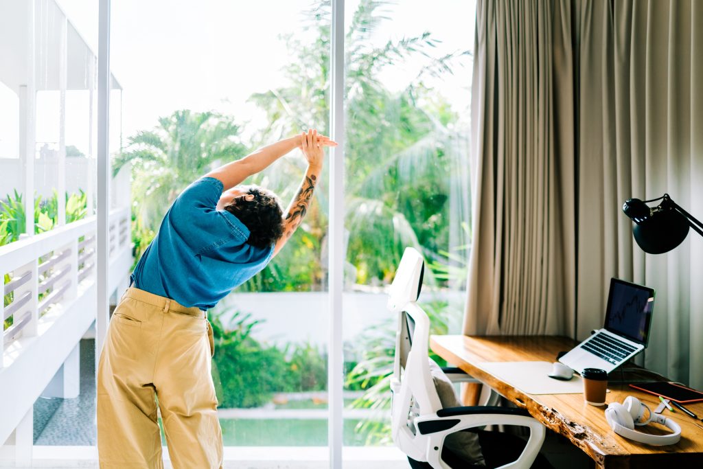 5 simple ways to relieve the aches and pains of sitting at a desk all day